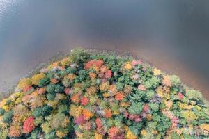 Colgate Lake in Upstate New York during peak fall foliage season. photo