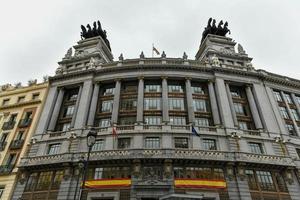 Madrid, Spain - Nov 20, 2021, The old Bilbao Vizcaya Bank building  today BBVA  with quadrigas on the top. photo