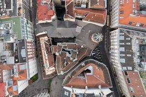 Aerial rooftop view of streets and buildings in Vienna, Austria. photo