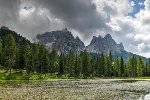 Summer view of Lake Antorno  Lago di Antorno  located in Dolomites area, Belluno Province, Italy. Lake Antorno, Three Peaks of Lavaredo, Lake Antorno and Tre Cime di Lavaredo, Dolomites, Italy. photo