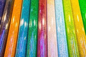 Colorful tubes with beads photo