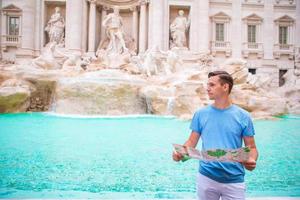 Man in Trevi Fountain, Rome, Italy photo