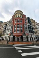 Beautiful architecture along Plaza Euskadi in Bilbao, Spain on a cloudy day. photo