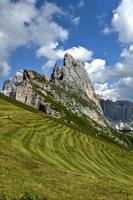 Morning view of the Gardena valley in Dolomite mountains. Location Puez-Geisler National Park, Seceda peak, Italy, Europe. Odle group is the landmark of Val di Funes. photo