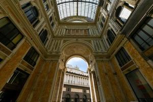 Naples, Italy - August 17, 2021, Interior view of Galleria Umberto I, a public shopping gallery in Naples, Italy. Built between 1887-1890 photo