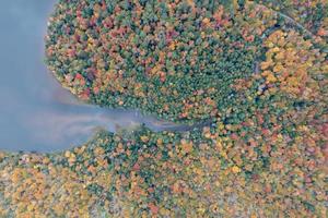 Colgate Lake in Upstate New York during peak fall foliage season. photo