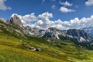 Morning view of the Gardena valley in Dolomite mountains. Location Puez-Geisler National Park, Seceda peak, Italy, Europe. Odle group is the landmark of Val di Funes. photo