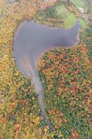 Colgate Lake in Upstate New York during peak fall foliage season. photo