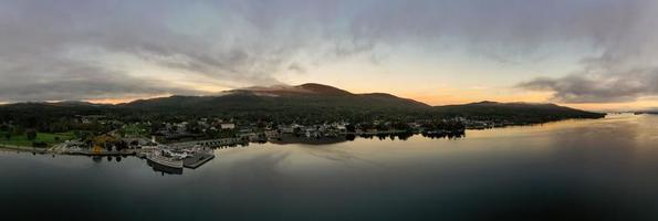 Lake George, New York - October 10, 2021, Tourist boats in the bay in Lake George, New York at dawn. photo