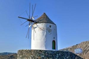 Ruins of old abandoned windmill in Emporio village on the south side of Santorni. Cyclades Islands, Greece. photo