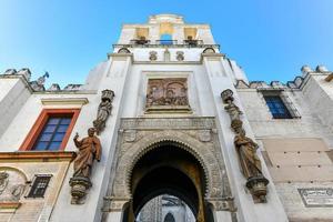 Wide angle view of Portal el Perdon or the Door of Forgiveness of the Seville Cathedral photo