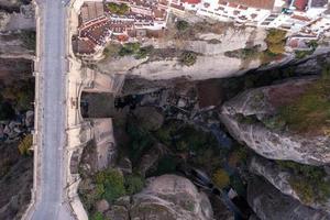 Rocky landscape of Ronda city with Puente Nuevo Bridge and buildings, Andalusia, Spain photo