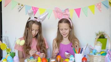 Happy easter. Beautiful little kids wearing bunny ears on Easter day. video