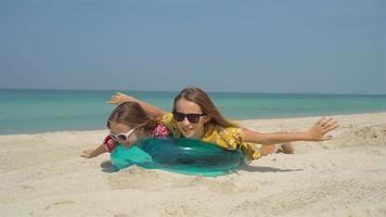 Adorable little girls during summer vacation have fun together video