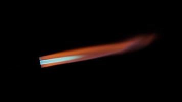 Close-up of flamethrower burner gas blowing fire with orange and blue flames on black background. video