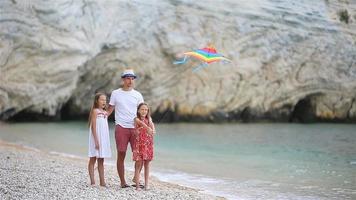Happy father and his adorable little daughter at beach video