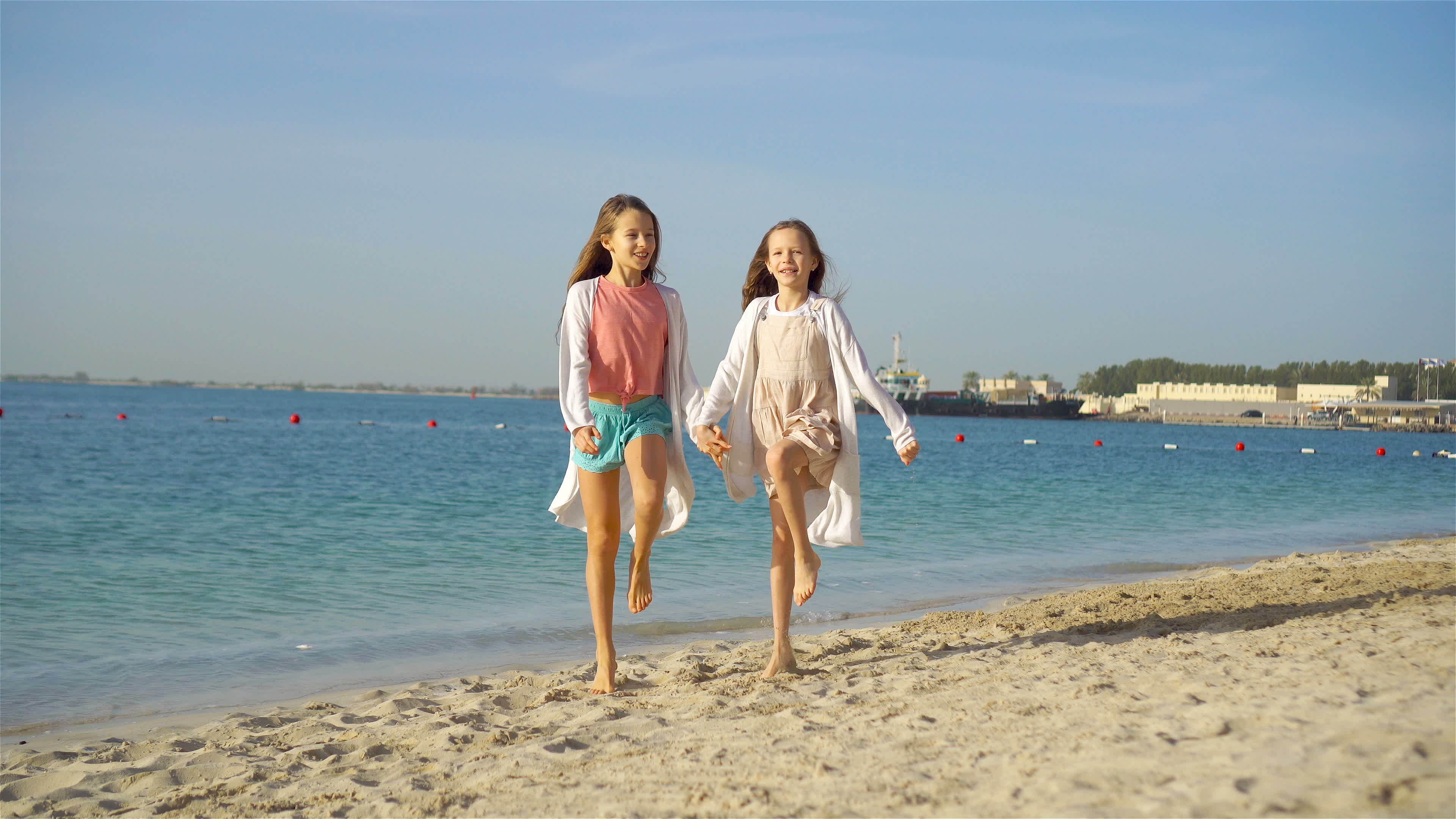 Little happy funny girls have a lot of fun at tropical beach playing together. Sunny day with rain in the sea 19968296 Stock Video at Vecteezy Little happy funny girls have a lot of fun at tropical beach playing together. Sunny day with rain in the sea 19968296 Stock Video at Vecteezy