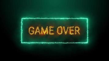 Game Over neon orange fluorescent text animation Green electric frame on black background video