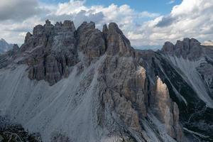 Beautiful sunny day in Dolomites mountains. View on Tre Cime di Lavaredo - three famous mountain peaks that resemble chimneys. photo