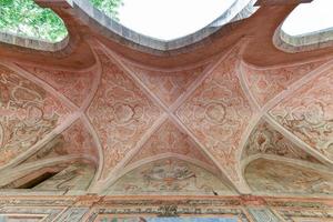 Naples, Italy - Aug 19, 2021, The cloisters of Santa Chiara are four monumental cloisters of Naples belonging to the monastic complex of Santa Chiara, famous for majolica. photo