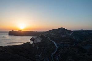 Red beach in Santorini, Cycladic Islands, Greece in the South Aegean. Beautiful summer landscape with one of the most famous beaches in the world. photo