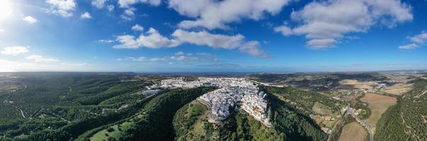 Andalusian town of Vejer de la Frontera with beautiful countryside on on a sunny day, Cadiz province, Andalusia. photo
