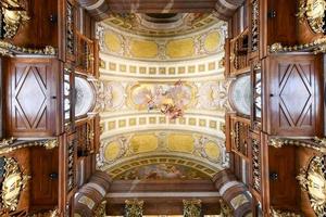Austria, Vienna - July 14, 2021, The Prunksaal, center of the old imperial library inside the Austrian National Library. Vienna Austria. photo