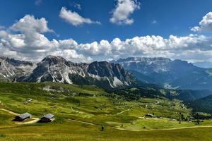 Morning view of the Gardena valley in Dolomite mountains. Location Puez-Geisler National Park, Seceda peak, Italy, Europe. Odle group is the landmark of Val di Funes. photo