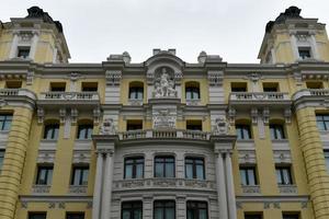 The building of the Star Insurance company in Madrid, Spain along Gran Via Street. Inscription Property of Star Insurance in Spanish. photo