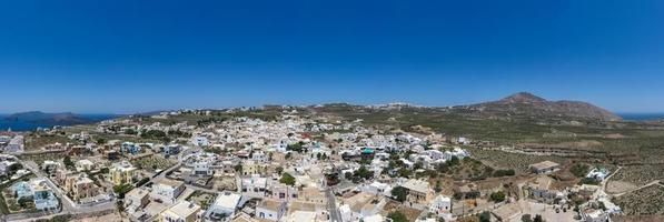 Aerial view of the village of Megalochori in Santorini, Greece. photo