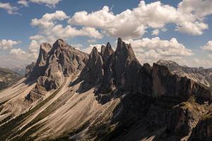 Morning view of the Gardena valley in Dolomite mountains. Location Puez-Geisler National Park, Seceda peak, Italy, Europe. Odle group is the landmark of Val di Funes. photo