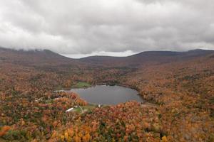 Colgate Lake in Upstate New York during peak fall foliage season. photo