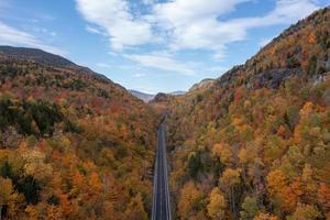 Aerial view of peak fall foliage in Keene, New York in upstate New York. photo