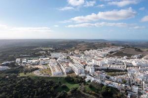 Andalusian town of Vejer de la Frontera with beautiful countryside on on a sunny day, Cadiz province, Andalusia. photo