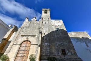 The church of Divino Salvador de Vejer de la Frontera, Cadiz, Spain, is a church located in the highest part of this town, within its old walled enclosure, declared a historical-artistic complex. photo