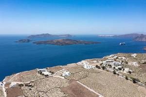 Aerial view of the village of Megalochori in Santorini, Greece. photo