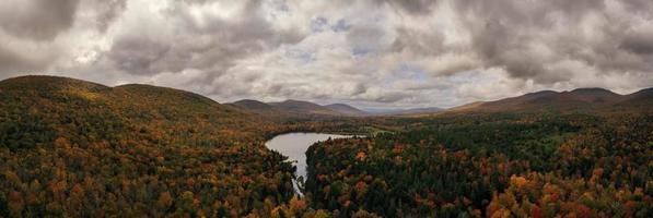 Colgate Lake in Upstate New York during peak fall foliage season. photo