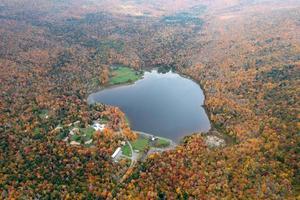 Colgate Lake in Upstate New York during peak fall foliage season. photo