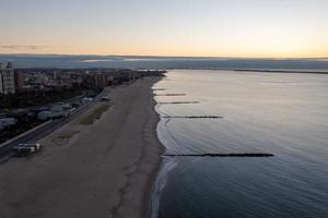 Aerial view along Coney Island in Brooklyn, New York at sunrise. photo