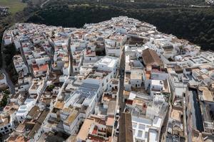 Andalusian town of Vejer de la Frontera with beautiful countryside on on a sunny day, Cadiz province, Andalusia. photo