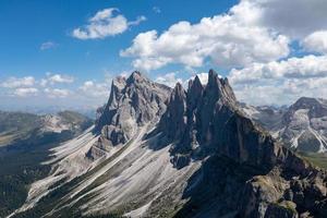 Morning view of the Gardena valley in Dolomite mountains. Location Puez-Geisler National Park, Seceda peak, Italy, Europe. Odle group is the landmark of Val di Funes. photo