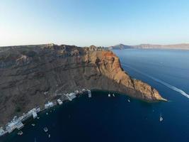 View of the cliffs of Thirasia in the caldera of Santorini, Cyclades islands, Greece, Europe photo
