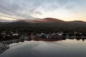 Lake George, New York - October 10, 2021, Tourist boats in the bay in Lake George, New York at dawn. photo