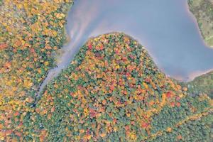 Colgate Lake in Upstate New York during peak fall foliage season. photo