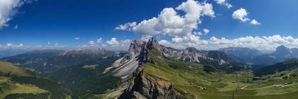 Morning view of the Gardena valley in Dolomite mountains. Location Puez-Geisler National Park, Seceda peak, Italy, Europe. Odle group is the landmark of Val di Funes. photo