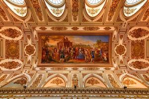 Caserta, Italy - Aug 21, 2021, A internal view of the Royal Palace of Caserta, a historic palace commissioned in the 18th century by Charles of Bourbon, king of Naples. photo