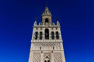 La Giralda, bell tower of the Seville Cathedral in Spain. photo