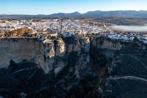 Bullring of the Royal Cavalry of Ronda aerial view at sunrise in Spain. photo