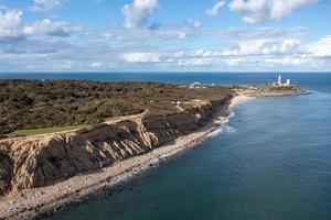 Aerial view of the Montauk Lighthouse and beach in Long Island, New York, USA. photo