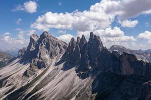 Morning view of the Gardena valley in Dolomite mountains. Location Puez-Geisler National Park, Seceda peak, Italy, Europe. Odle group is the landmark of Val di Funes. photo